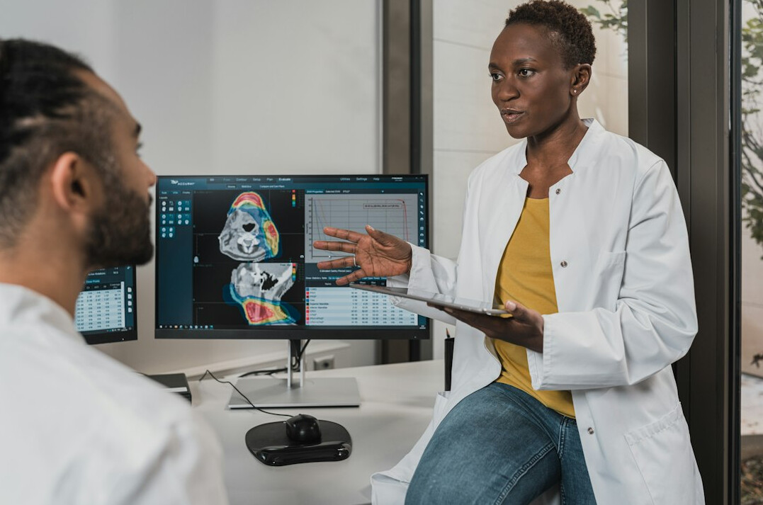 person talking to doctor