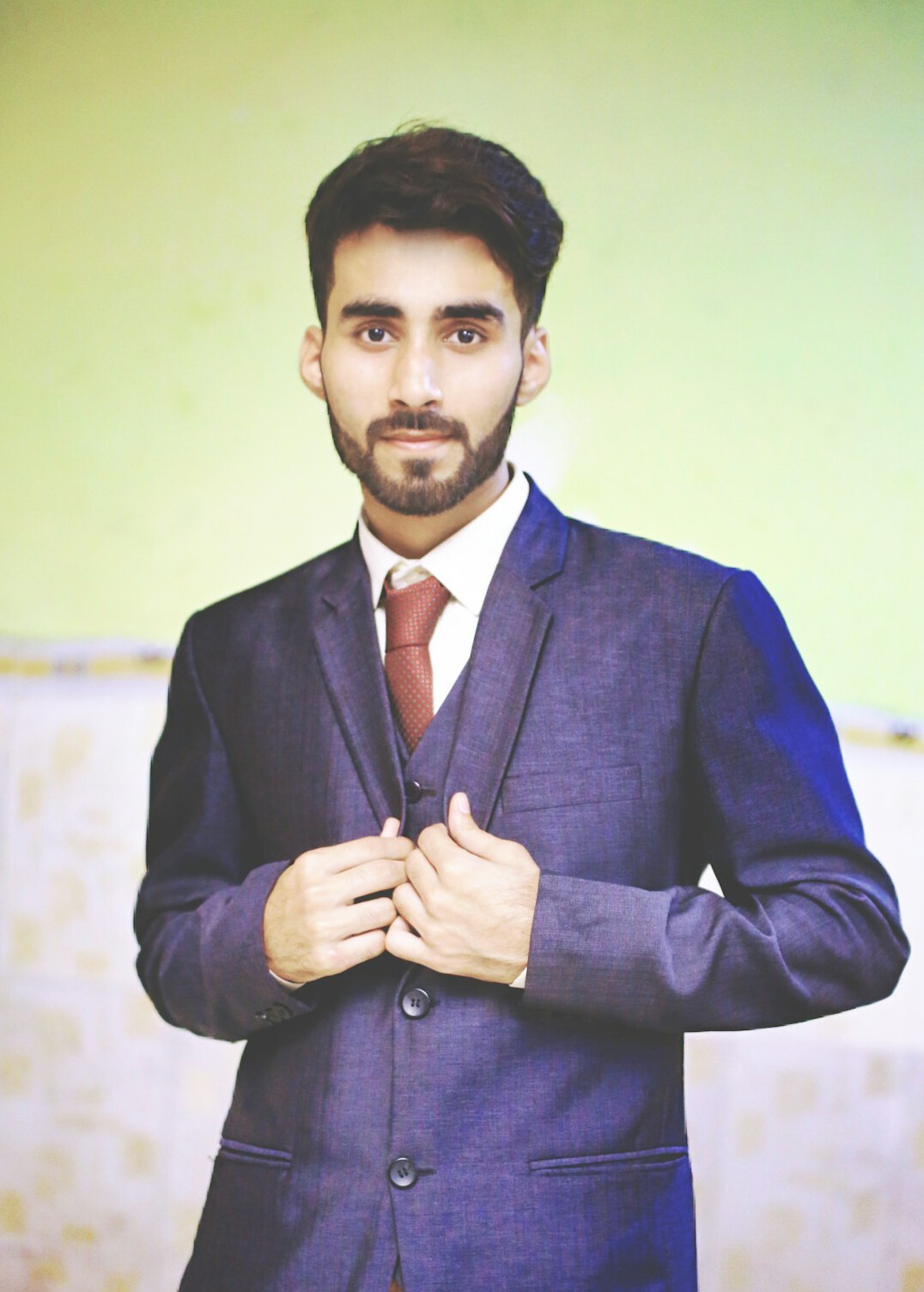 Businessman portrait in suit with neutral background
