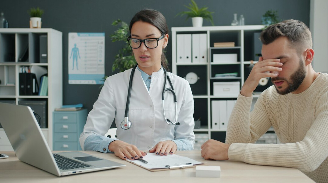 person consulting doctor