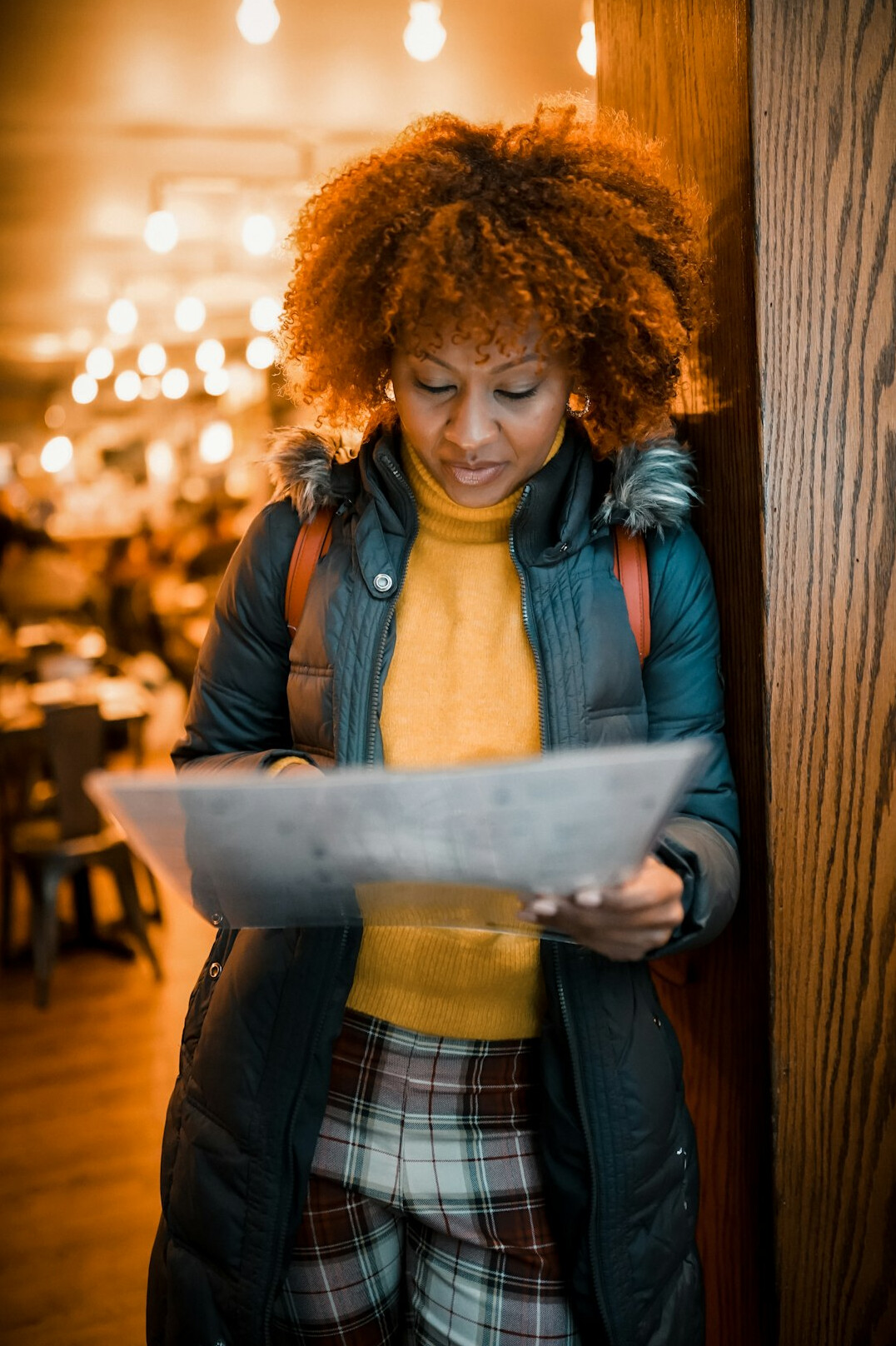 smiling woman with insurance documents